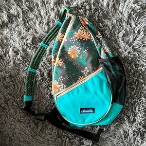 Kavu crossbody bag, teal with flower pattern. Barely used